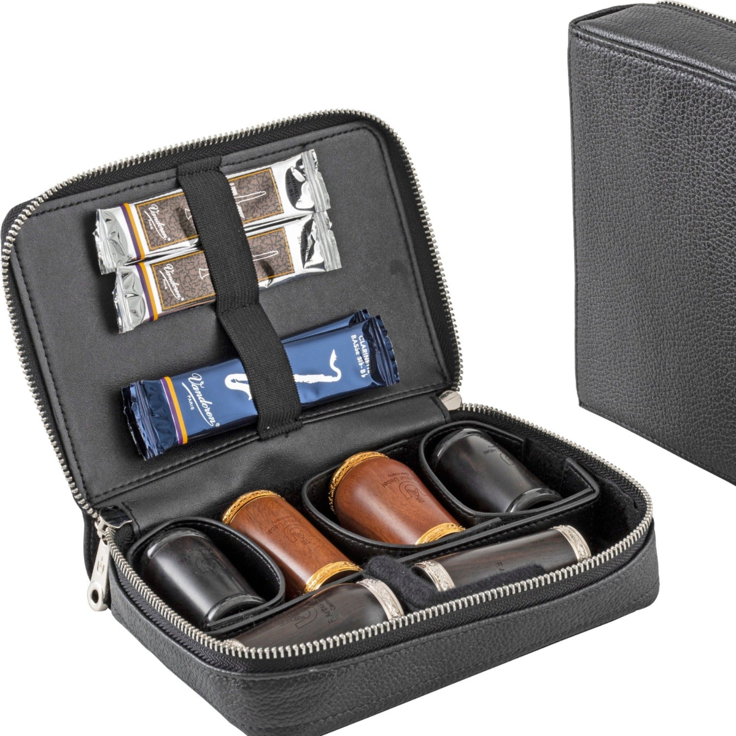 Uebel accessory pouch, open to show a variety of barrels and reeds. 