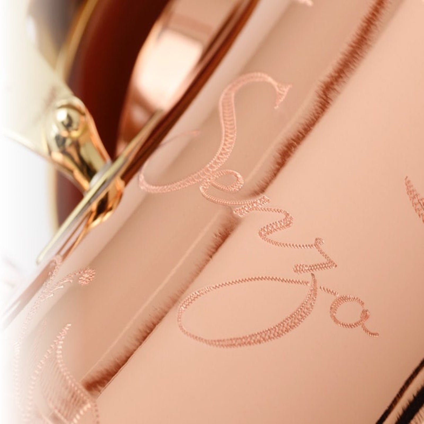 extreme closeup of "Senzo" engraving on bell